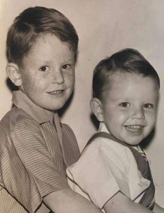 Richard holding his brother Mark 